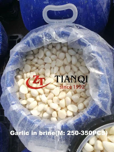 Garlleg Gwyn mewn heli yn y drwm